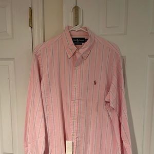 Two men’s button down oxford cloth shirts.  Sold as a pair.
